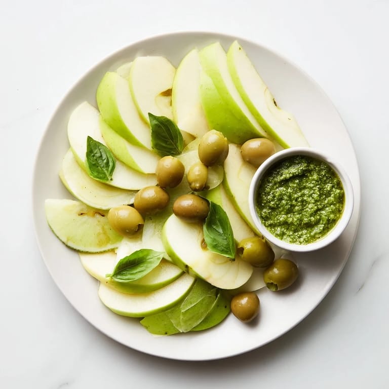 Fresh lime wedges and green olive briny flavor highlight this easy The Emerald City appetizer spread.