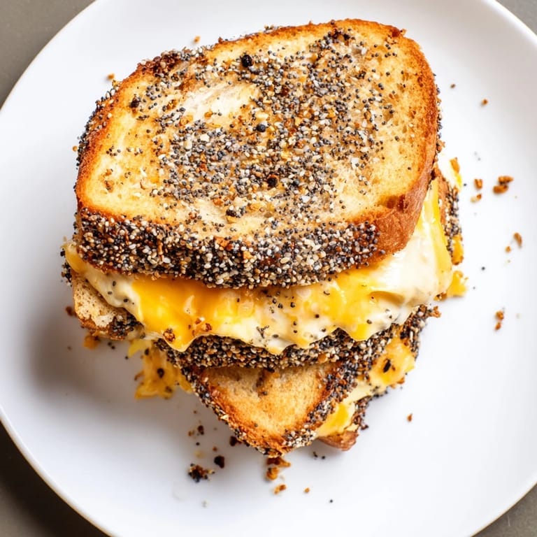 Get ready for comfort food: a close-up of a delicious everything bagel grilled cheese.